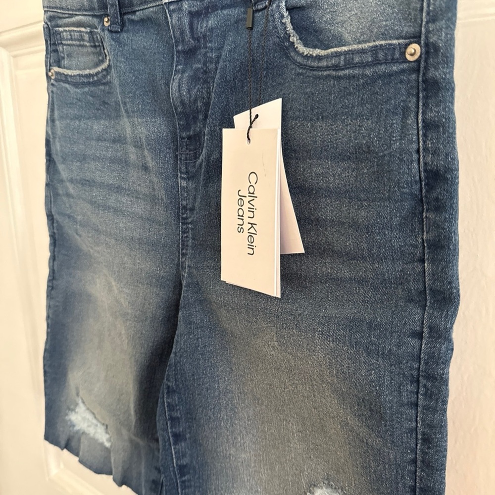 Calvin Klein Jeans Junior’s Distressed Denim Shorts